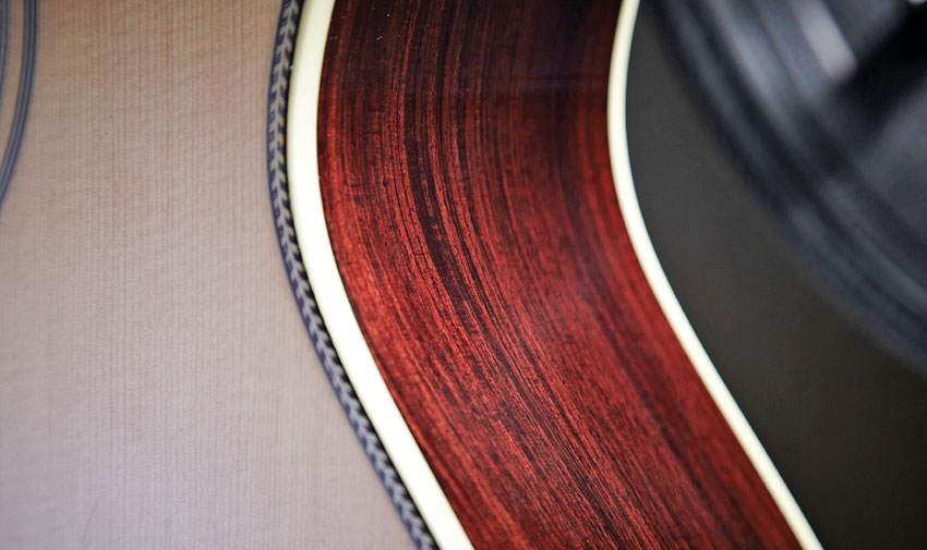 Herringbone purfling surround the soundhole and front