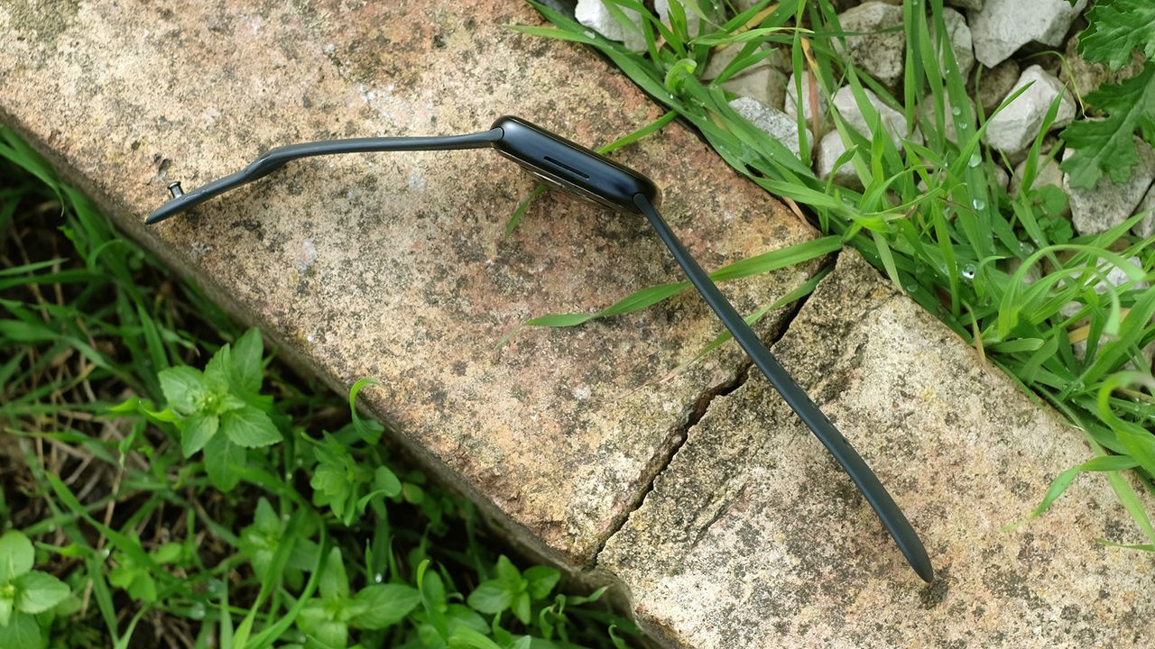 The side profile of the Apple Watch Series 8, with it placed on a brick.