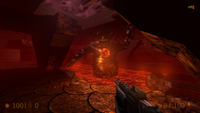 Gordon Freeman fights Quake's first boss, Chthon.