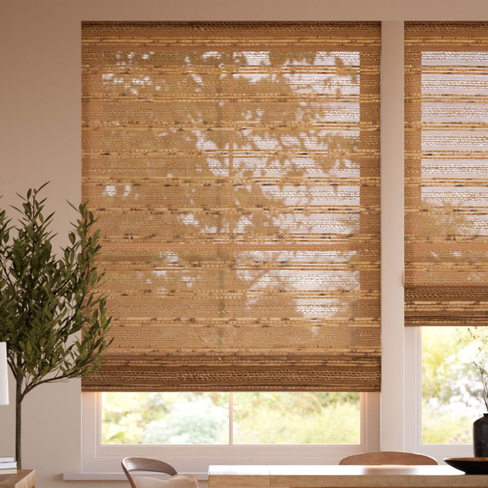 Natural woven blinds on white wall with plant to left hand side