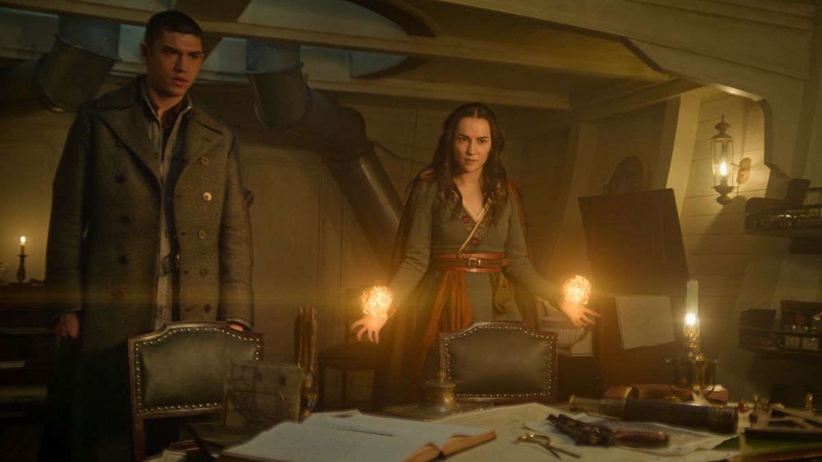 Alina (jessie Mei Li) using her powers in a ship next to Mal (Archie Renaux) in Shadow and Bone season 2