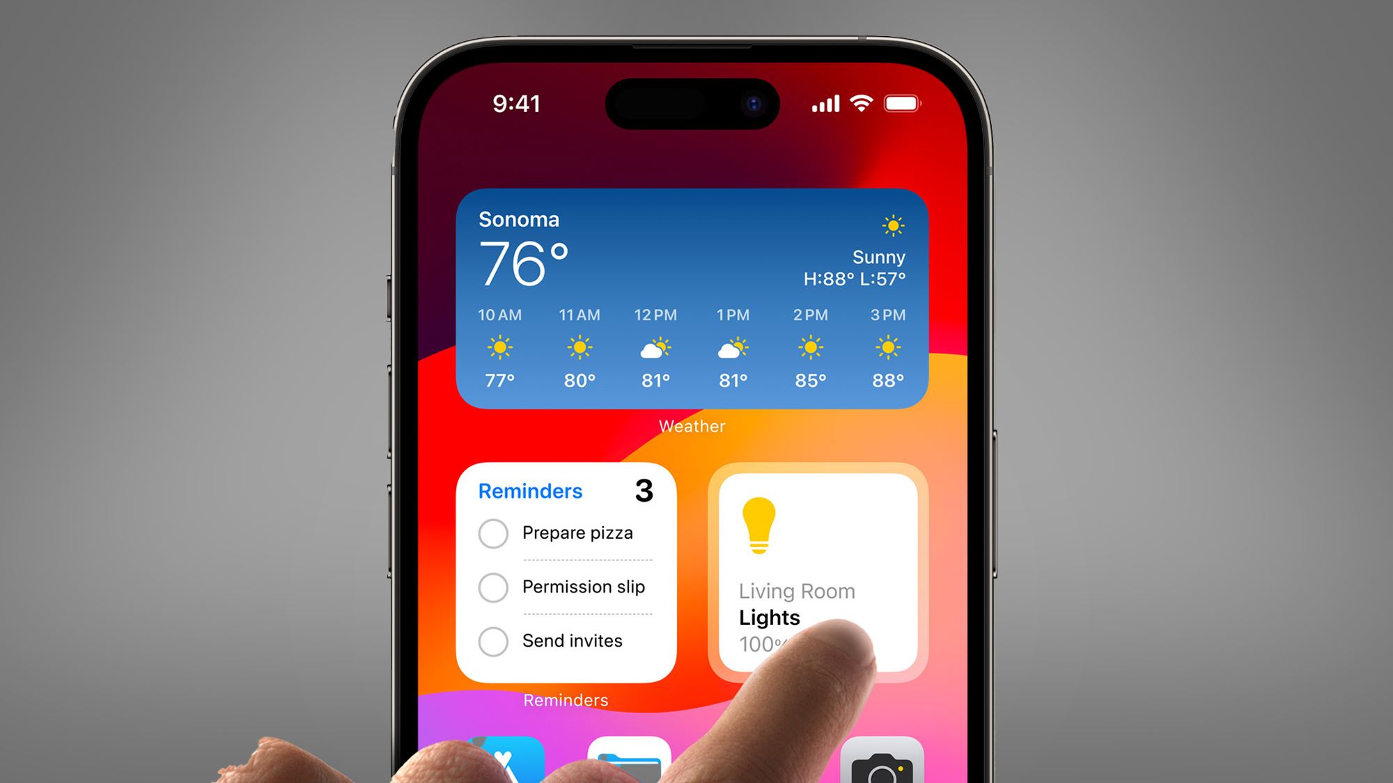 A finger tapping an interactive widget on an iPhone in iOS 17