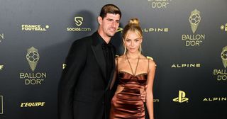 Real Madrid star Thibaut Courtois wins the Yachine trophy 2022: Real Madrid's Belgian goalkeeper Thibaut Courtois and his girlfriend Mishel Gerzig pose upon arrival to attend the 2022 Ballon d'Or France Football award ceremony at the Theatre du Chatelet in Paris on October 17, 2022.