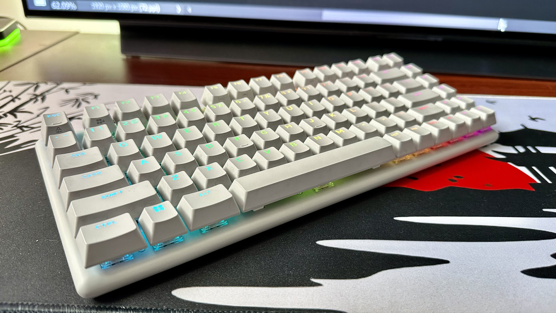Alienware Pro Keyboard in Lunar White with all keys fully lit.