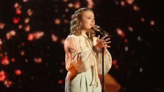 Leah Marlene sings on stage on American Idol