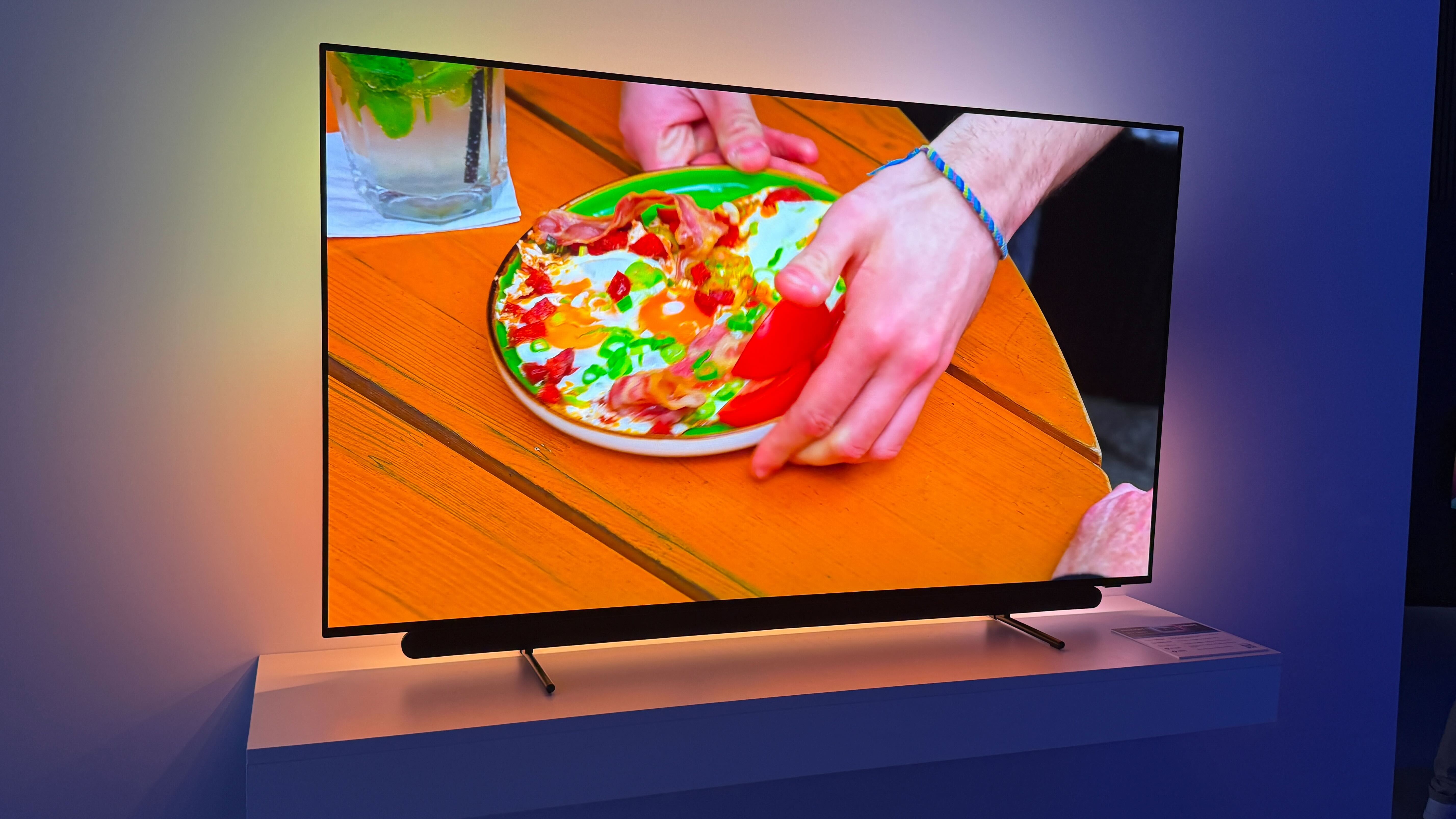 Philips OLED911 on a white table and background