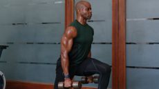 Man exercising with dumbbells