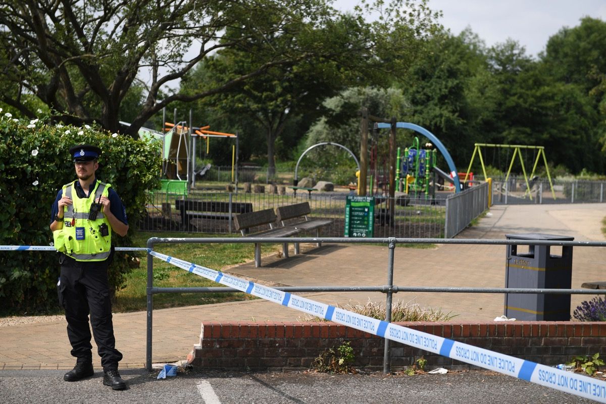 A police officer stands at a cordon by a play park at Queen Elizabeth Gardens in Salisbury, England, on July 5, 2018, after a man and woman were found unconscious after exposure with the nerve agent Novichok.