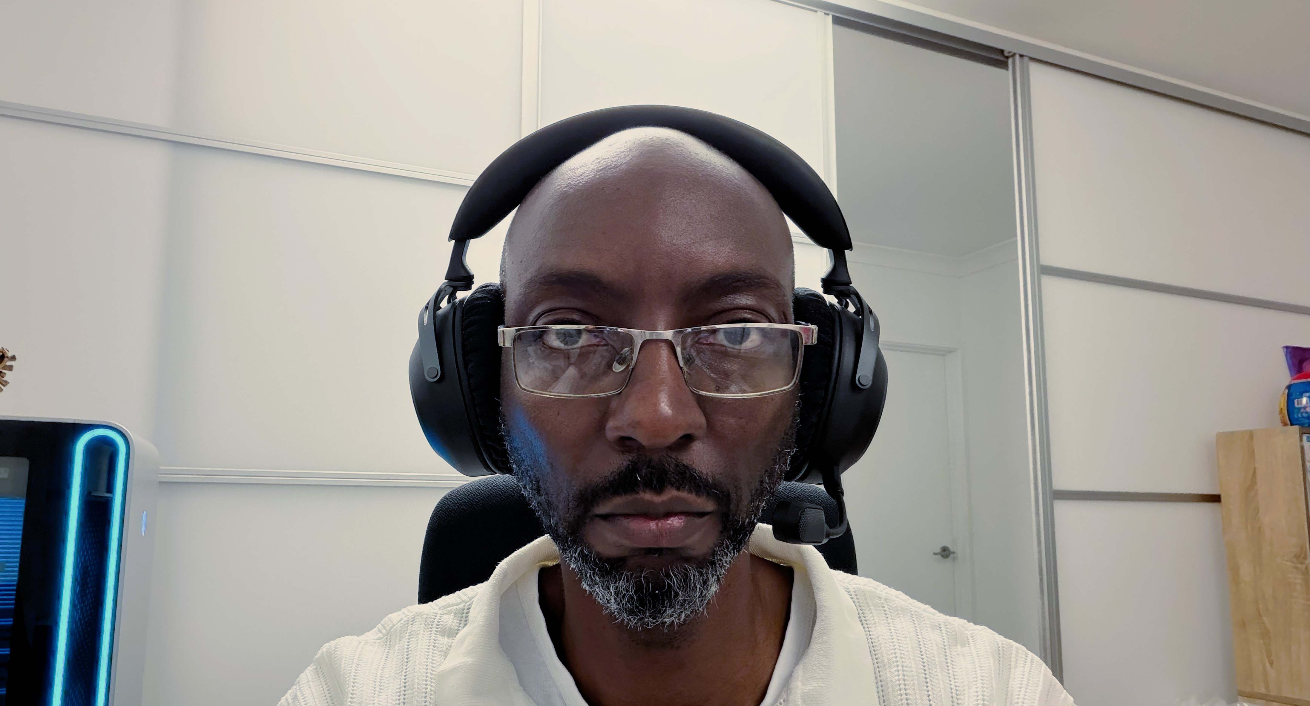 HyperX Cloud Alpha 2 Wireless gaming headset being worn by Kizito Katawonga