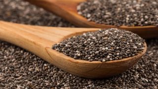 chia seeds on wooden spoon