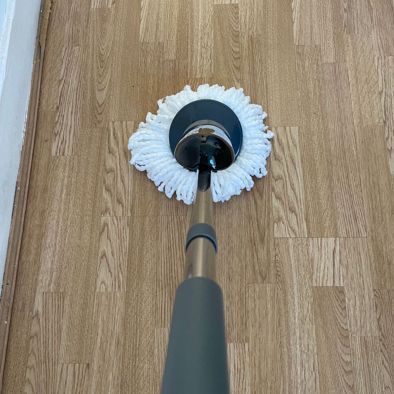 Minky Spritz &amp; Spin Spray Mop on wooden flooring