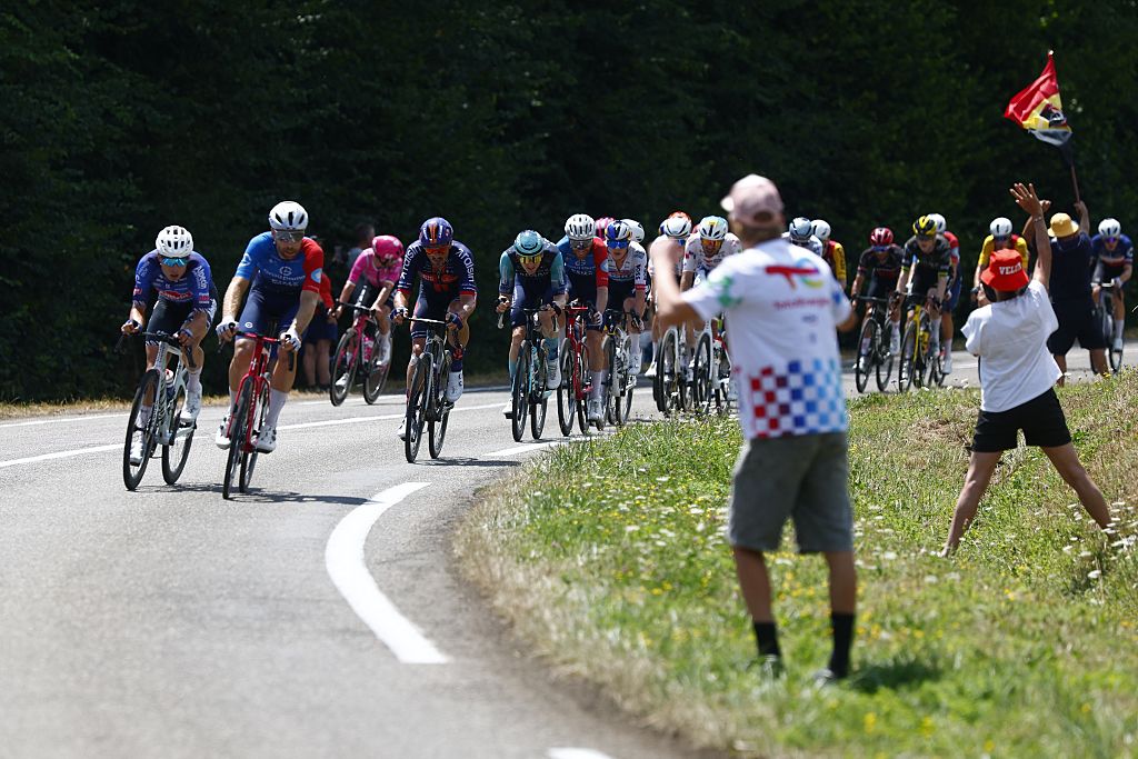 The pack of riders pictured in action during stage 13 of the 2026 Tour de France cycling race, a stage of 205km from Dole to Belfort, on Friday 17 July 2026. The 113th edition of the Tour de France starts on Saturday 4 July in Barcelona, Spain, and will finish in Paris, France on the 26th of July.BELGA PHOTO POOL LUCA BETTINI (Photo by POOL LUCA BETTINI / BELGA MAG / Belga via AFP)