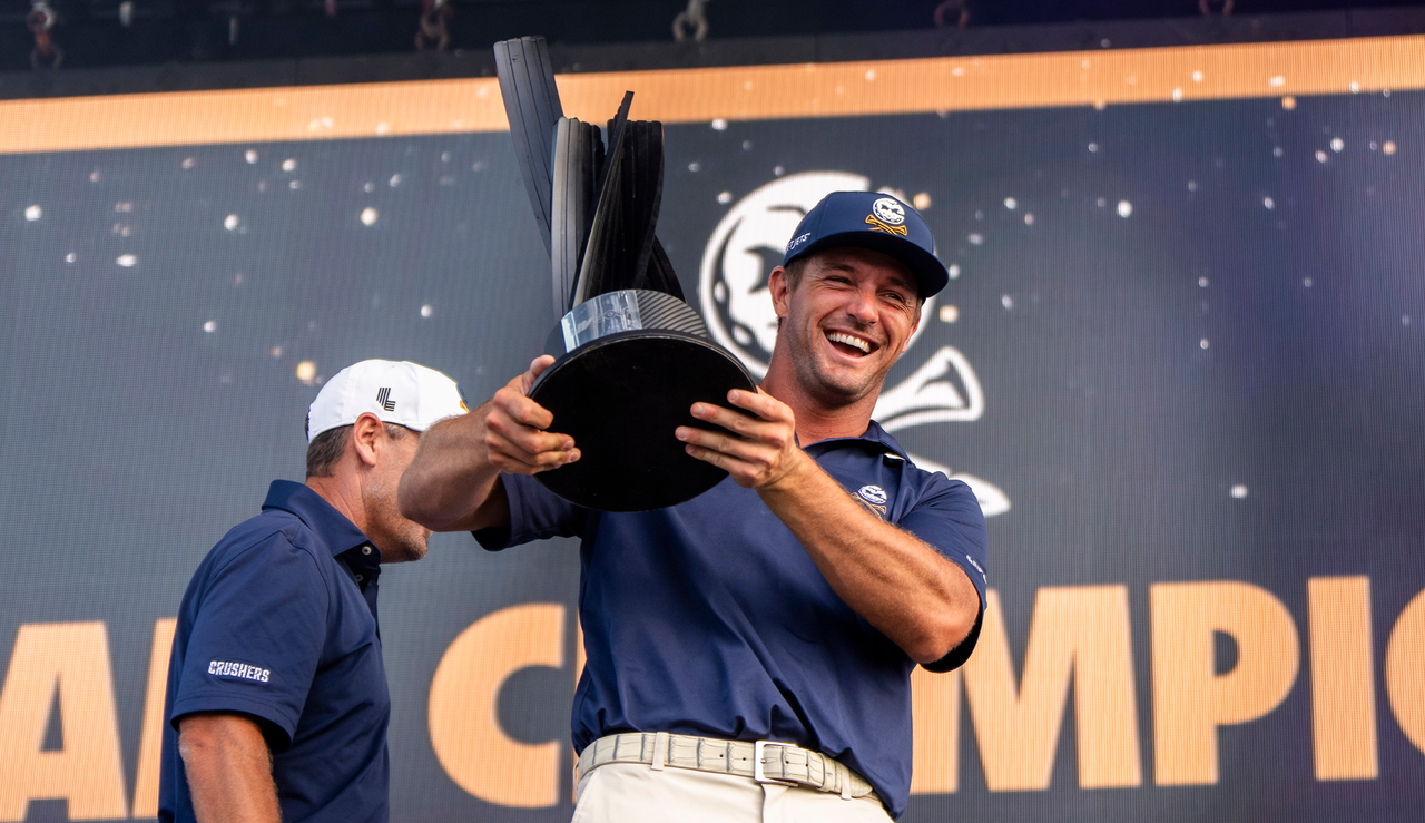 Bryson DeChambeau holds the LIV Golf title in his hands