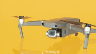 DJI Mavic 2 Pro drone on yellow background