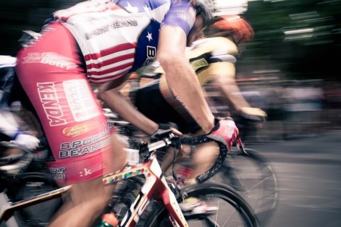 Riders fighting at the front.