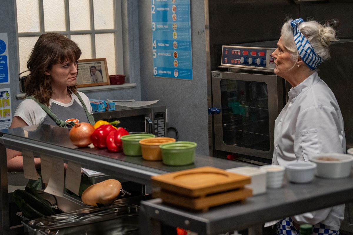 Gail has a conversation with Mary in the kitchen at the Woolpack