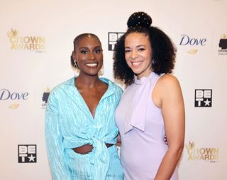 Issa Rae with her cofounder and sister-in-law, Hannah Diop, arrive for the 2022 CROWN Awards.