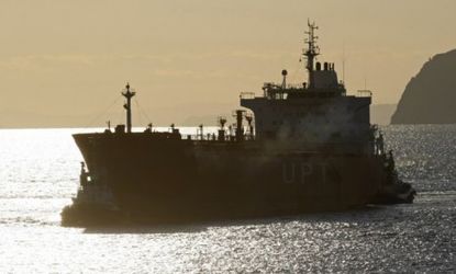 A oil tanker pulls into a Spanish port: Iran has cut off oil shipments to France and Britain, and has also threatened to stop sales to Spain and other EU countries.