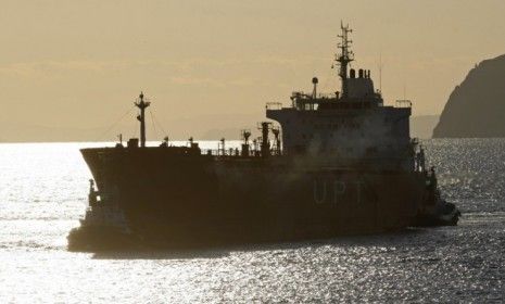 A oil tanker pulls into a Spanish port: Iran has cut off oil shipments to France and Britain, and has also threatened to stop sales to Spain and other EU countries.