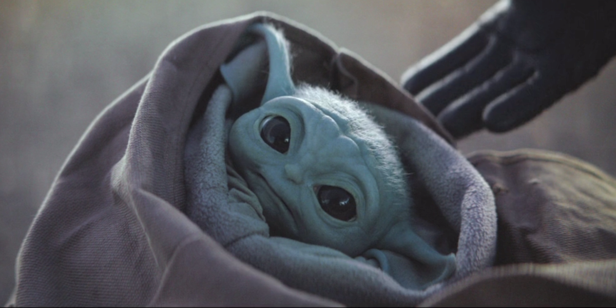 the mandalorian season 1 finale baby yoda punched screenshot