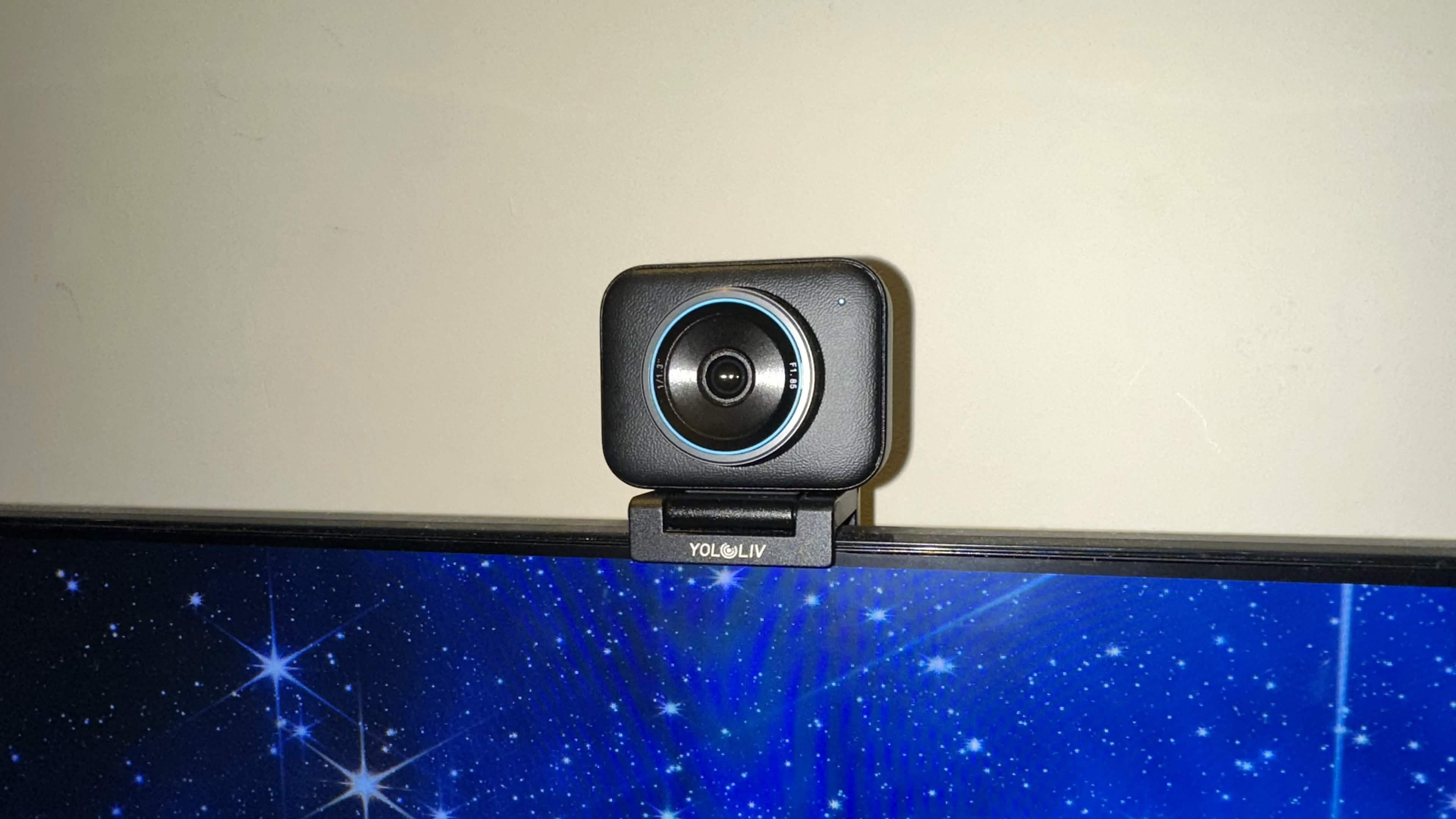 A YoloLiv YoloCam S3 Review image of the webcam on top of a gaming monitor