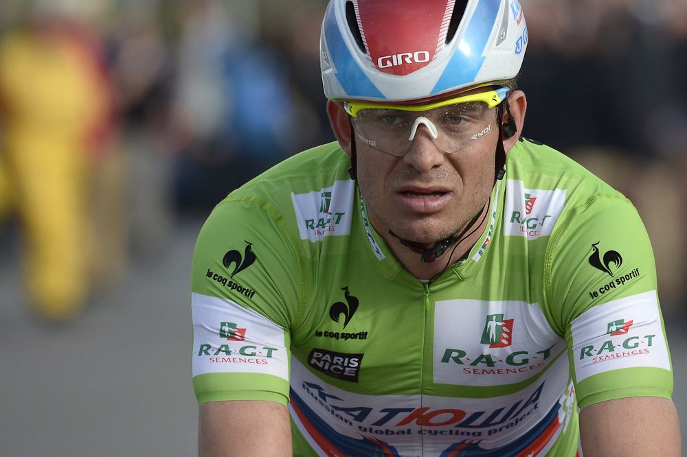 Alexander Kristoff, wearing the best sprinter's green jersey, reacts at the end of the second stage.