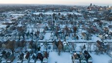 Snow over houses.