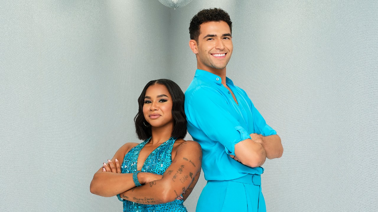 From left to right: Jordan Chiles and Ezra Sosa standing back to back in a photo fro Dancing with the Stars. 