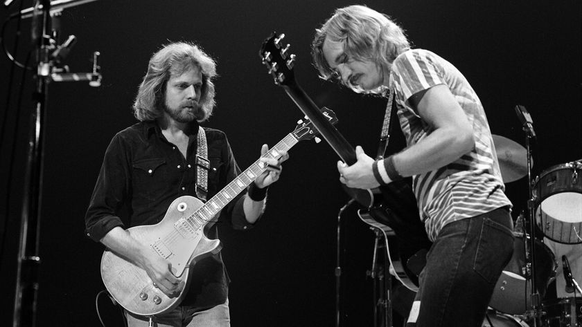 Photo of EAGLES and Don FELDER and Joe WALSH; L-R Don Felder and Joe Walsh performing on stage