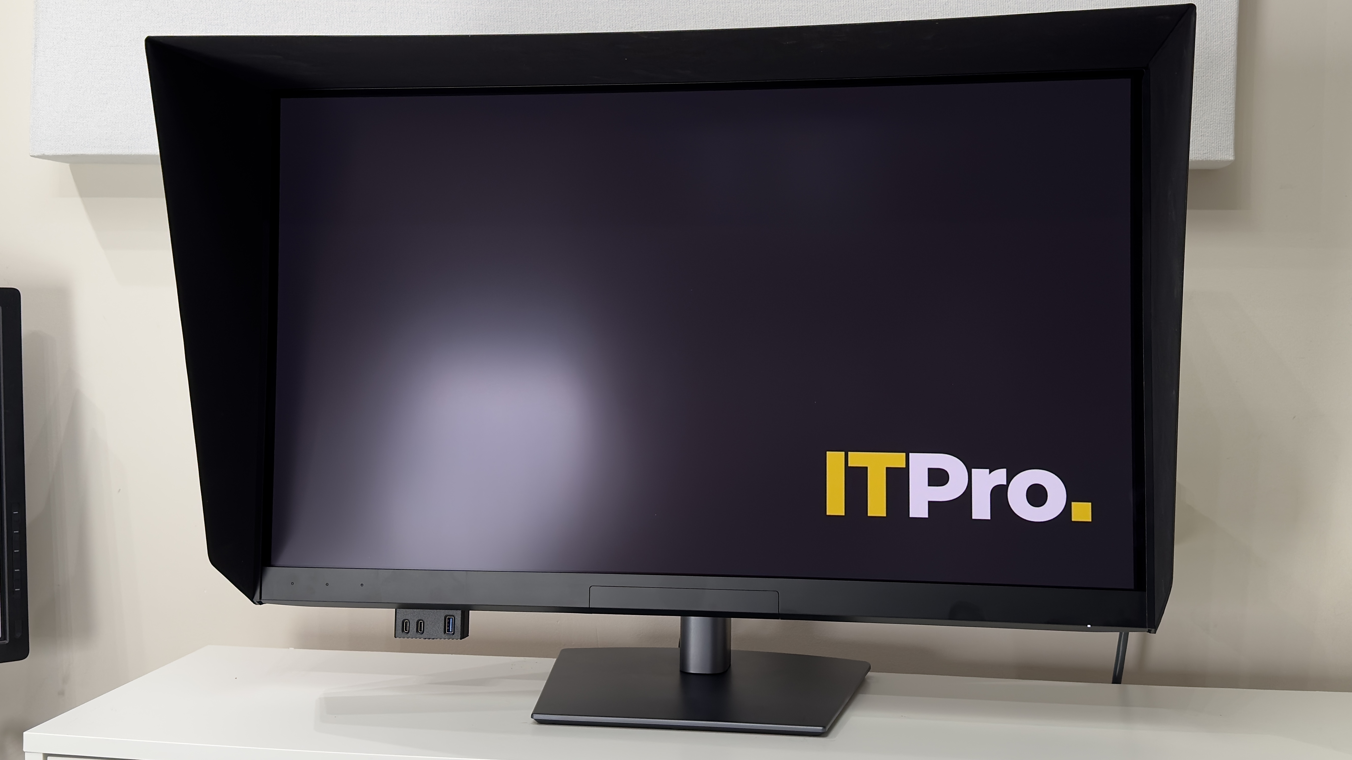 The Dell UltraSharp U3226Q monitor on a desk