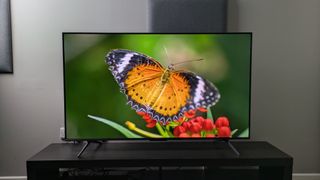 TCL C6K with orange butterfly on screen 
