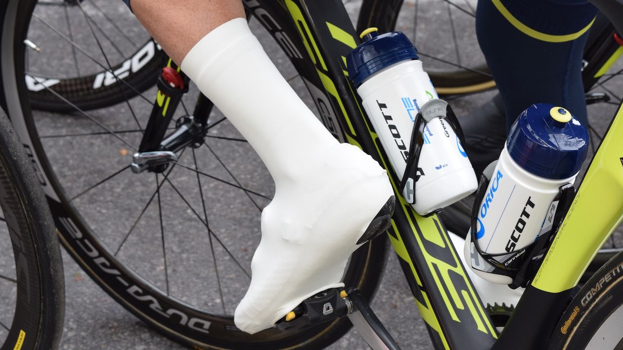 Orica-Scott had lycra overshoes on the wet stages, similar to those produced by VeloToze