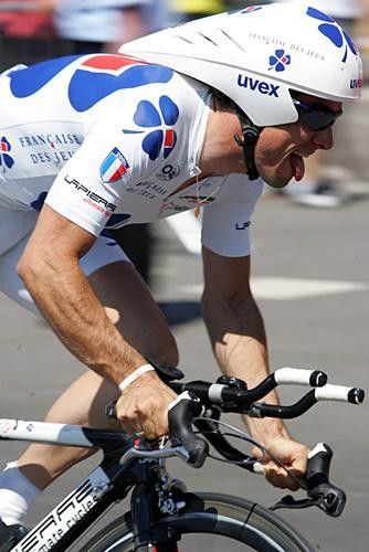 Sebastian Joly (Fran&ccedil;aise Des Jeux) tongue out and going fast.