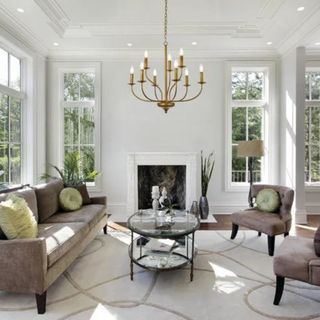 A living room with a chandelier from Wayfair