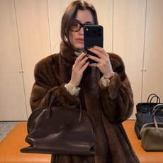 woman wearing brown faux fur coat 2026