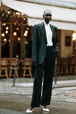 woman wearing white pumps in Paris