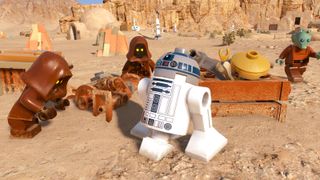 R2D2 standing in front of Jawas in Lego Star Wars: The Skywalker Saga