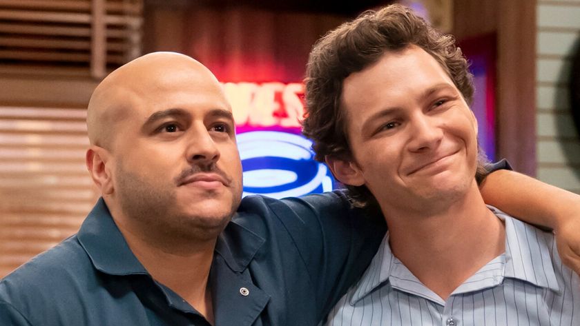 Ruben and Georgie look onward and smile