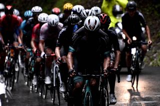 Moody pictures in the rain on stage eight of the Tour de France 2021