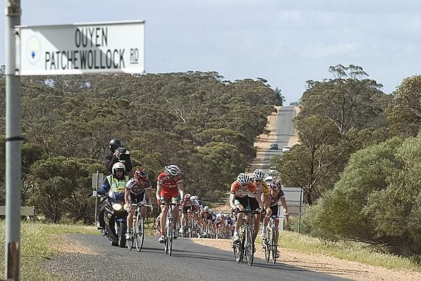 Riders escape the peloton on the Ouyen Patchewollock road during stage eleven of the tour.