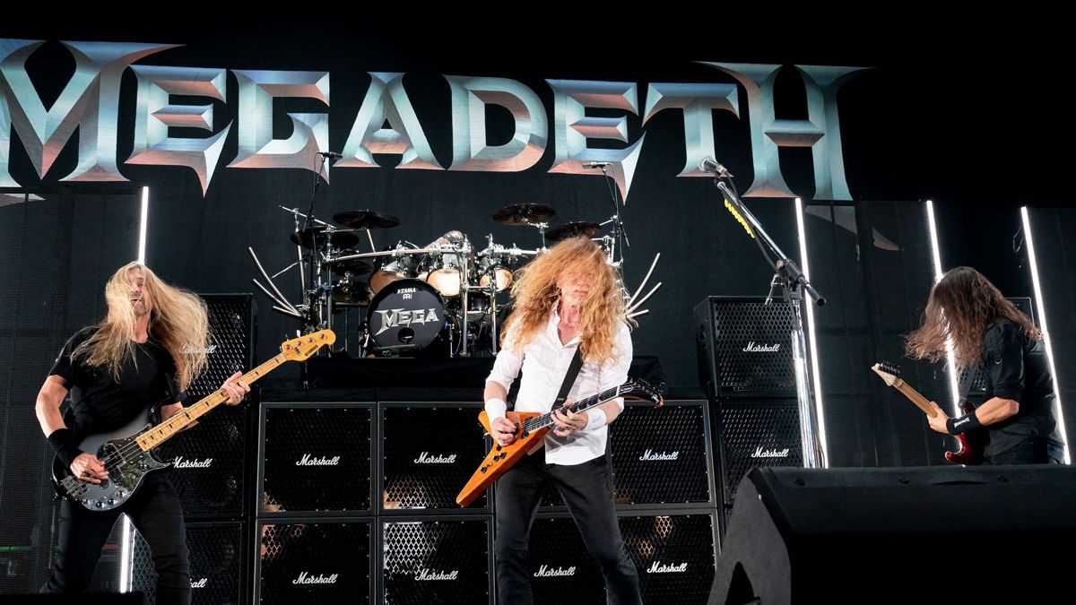 James Lomenzo, Dave Mustaine, and Kiko Loureiro of Megadeth performs on stage at the Germania Insurance Amphitheater in Austin, Texas on August 20, 2021.