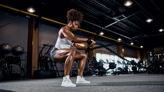 How much protein to build muscle: A woman at the gym