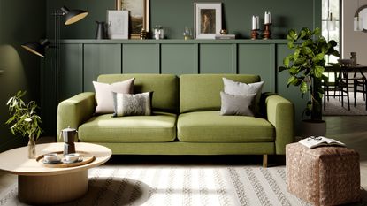A living room with a light-coloured sofa with milti-coloured cushions