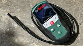 Bosch Universal Inspect borescope on stone surface