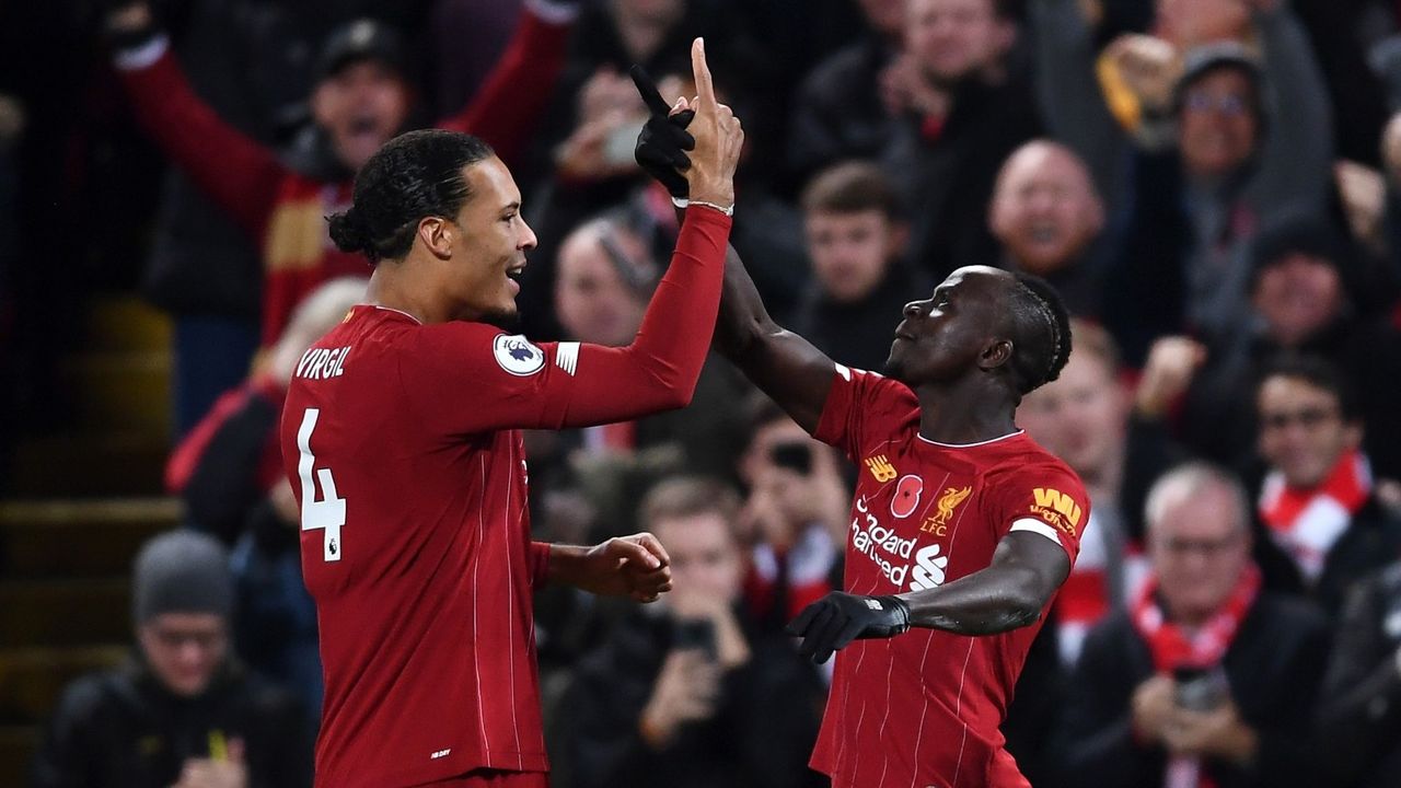 Virgil van Dijk and Sadio Mane celebrate after Liverpool&amp;#039;s third goal