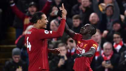 Virgil van Dijk and Sadio Mane celebrate after Liverpool's third goal