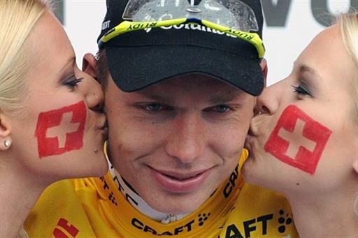 The podium ladies were feeling patriotic after Switzerland's World Cup win over Spain. Tony Martin was just an excuse to show their pride.