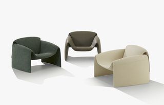 Three armchairs in dark grey, brown and cream