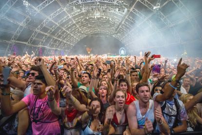 Fans listen to David Guetta at Coachella April 12