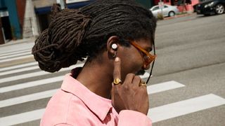 Google Pixel Buds Pro 2 on person outside